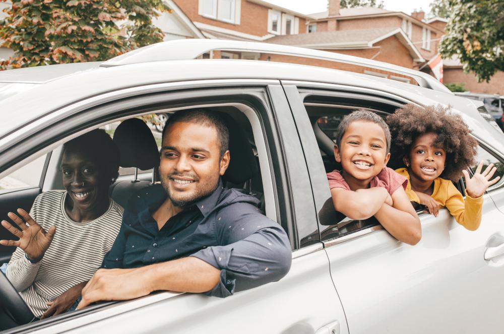 Family driving in car.